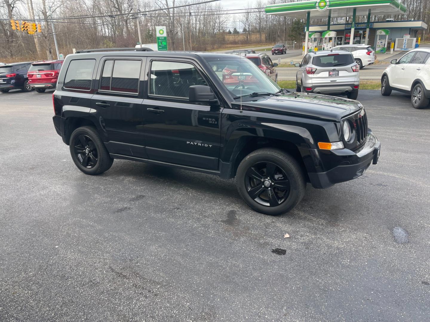 2017 Black /Black Jeep Patriot Latitude 4WD (1C4NJRFB5HD) with an 2.4L I4 DOHC 16V engine, 6-Speed Automatic transmission, located at 11115 Chardon Rd. , Chardon, OH, 44024, (440) 214-9705, 41.580246, -81.241943 - This 2017 Jeep Patriot Latitude with 4WD and only 55,000 miles on the odometer. This SUV comes equipped with a 2.4L engine for powerful performance. It features a comfortable and spacious interior with modern amenities. The 4WD capability ensures that you can handle any terrain or weather conditions - Photo#3